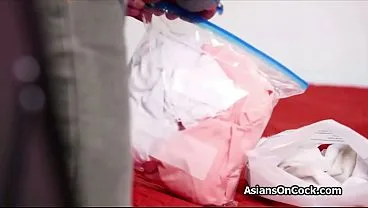 Lifelike Asian Doll Programmed to Satisfy