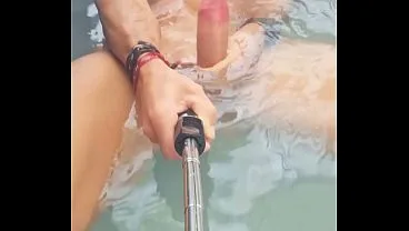 Jacuzzi Stud Masturbates Spitting on Cock