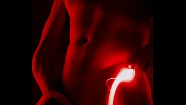 Femboy in Red Lingerie with Whip